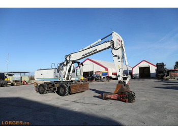 Mobilbagger New Holland MH 6.6 + Sandvic Hammer: das Bild 2