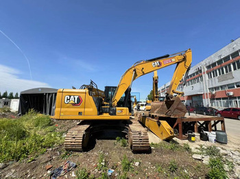 CATERPILLAR 323 Kettenbagger