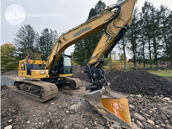 CATERPILLAR 323 Kettenbagger