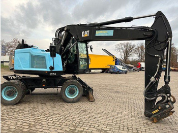 Mobilbagger CAT M315F, OilQuick, Hammer- u- Greifersteuerung: das Bild 2