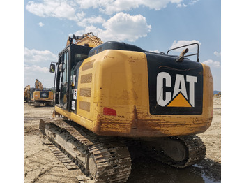 Kettenbagger CATERPILLAR 320 E: das Bild 2