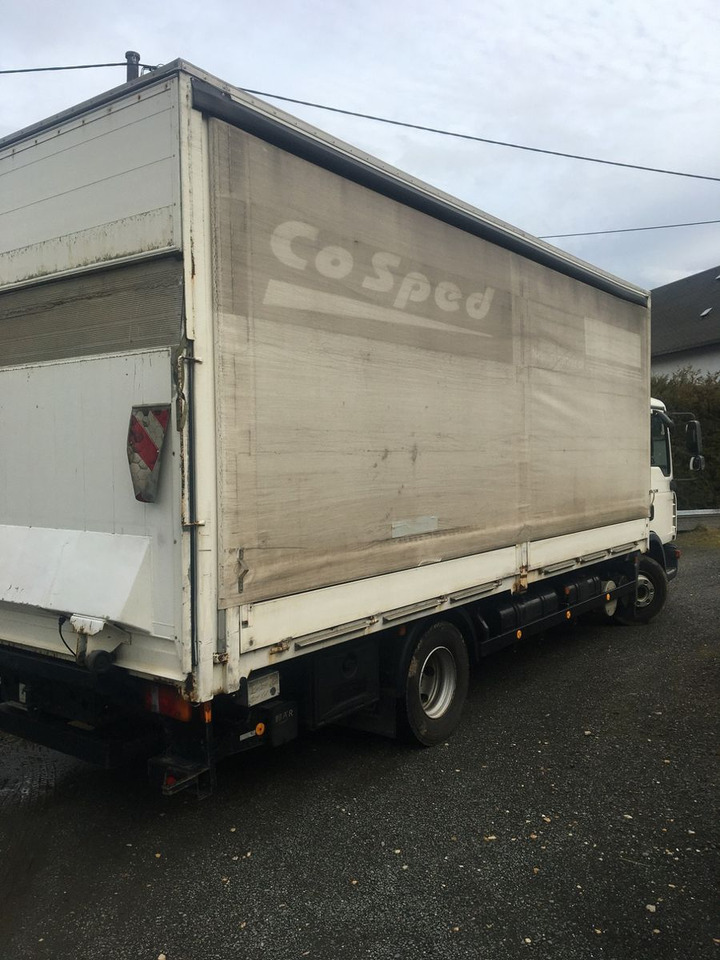 MAN 12.210 Erst 302000 km - Plane LKW: das Bild 3 MAN 12.210 Erst 302000 km - Plane LKW: das Bild 3