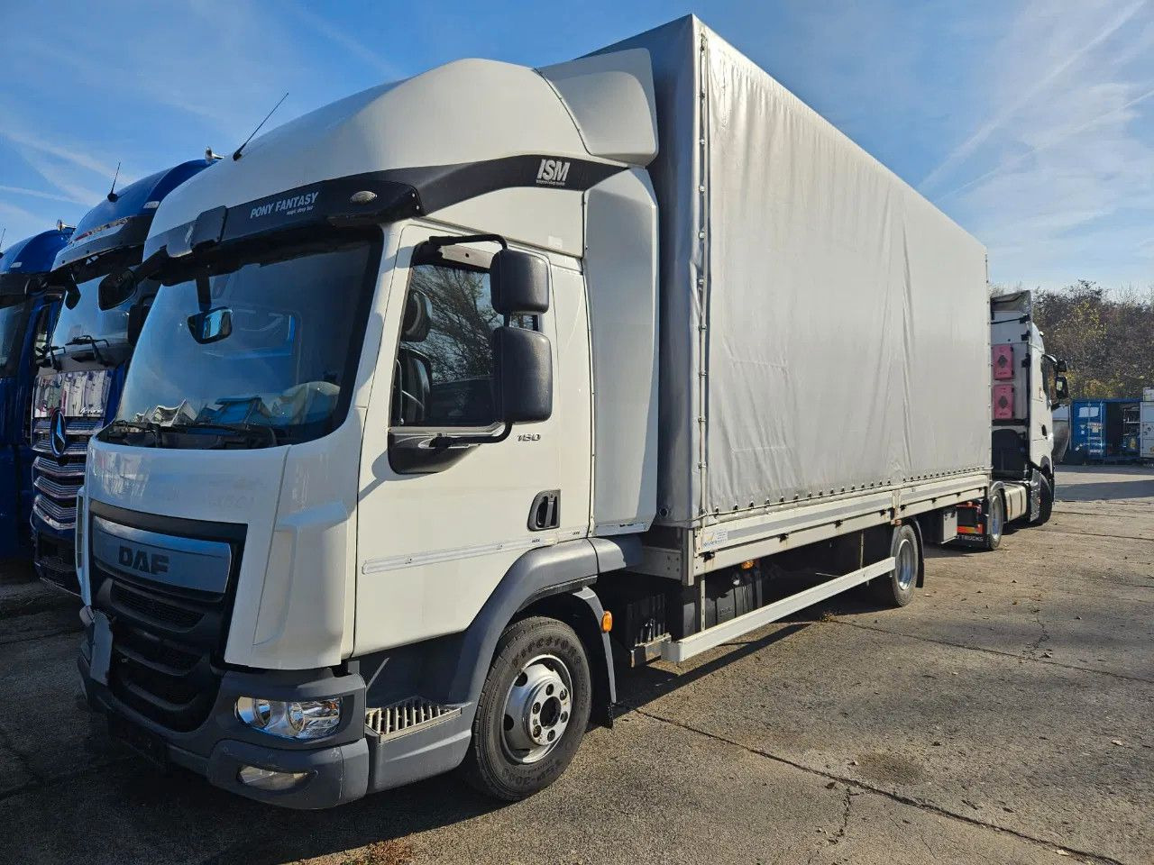 DAF LF 180 7.5 t - Plane LKW: das Bild 1 DAF LF 180 7.5 t - Plane LKW: das Bild 1