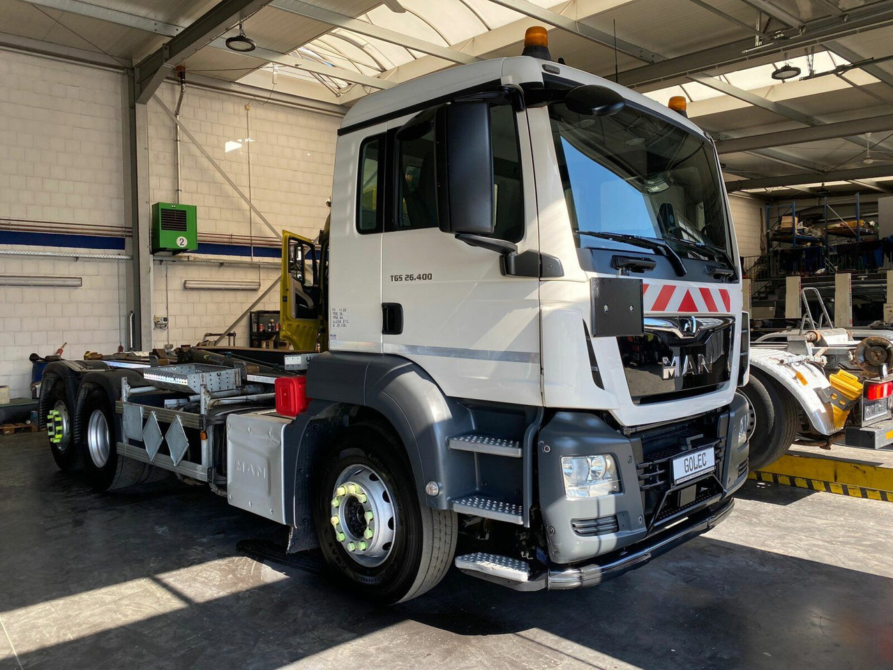 MAN TGS 28.400 6x2-4 Abrollkipper Lift-Lenkachse - Abrollkipper, Autokran: das Bild 1 MAN TGS 28.400 6x2-4 Abrollkipper Lift-Lenkachse - Abrollkipper, Autokran: das Bild 1