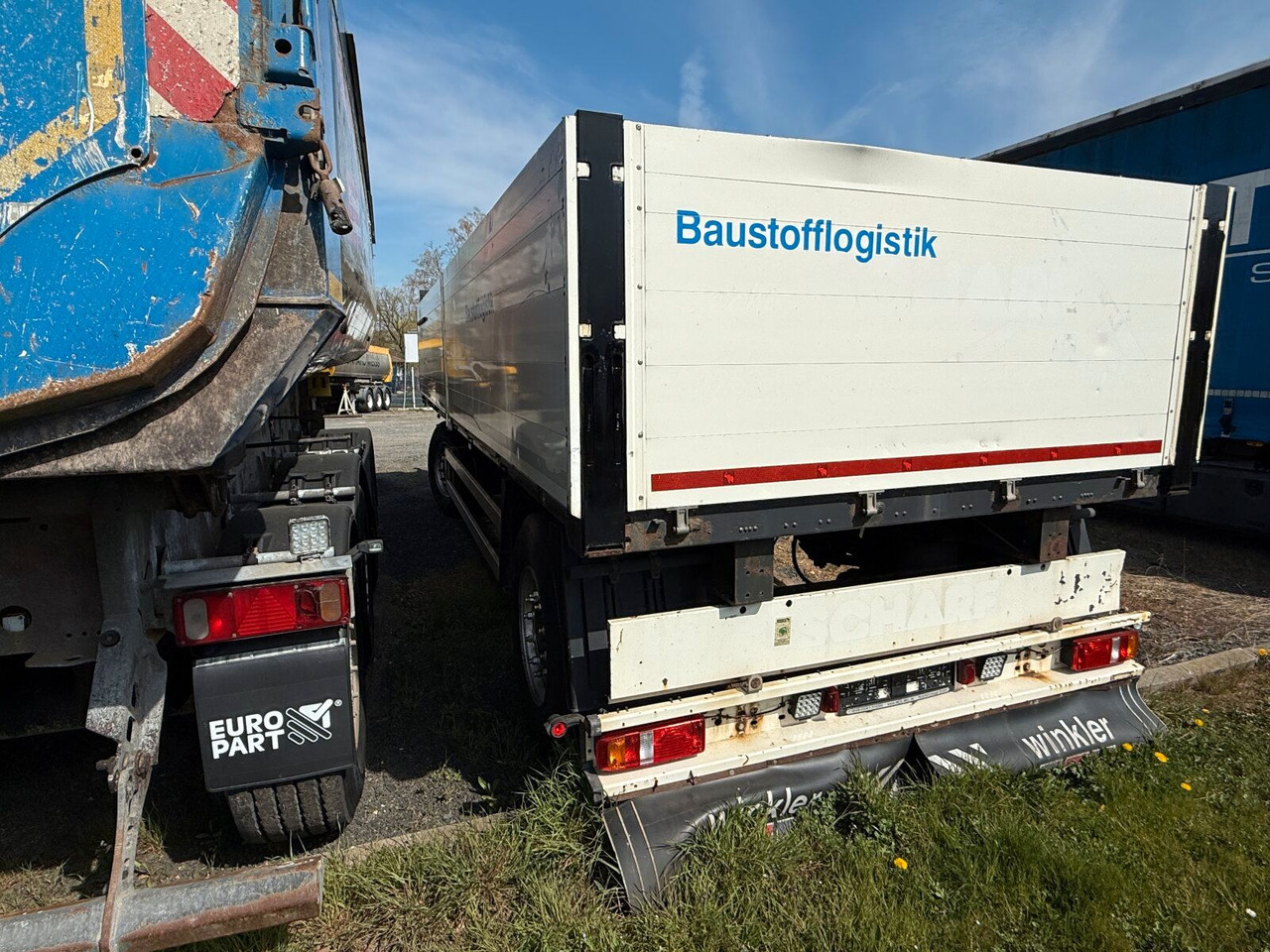 Schmitz Cargobull Gotha AFG 18 BS Baustoffanhänger 2 Achse - Pritschenanhänger/ Plattformanhänger: das Bild 5 Schmitz Cargobull Gotha AFG 18 BS Baustoffanhänger 2 Achse - Pritschenanhänger/ Plattformanhänger: das Bild 5