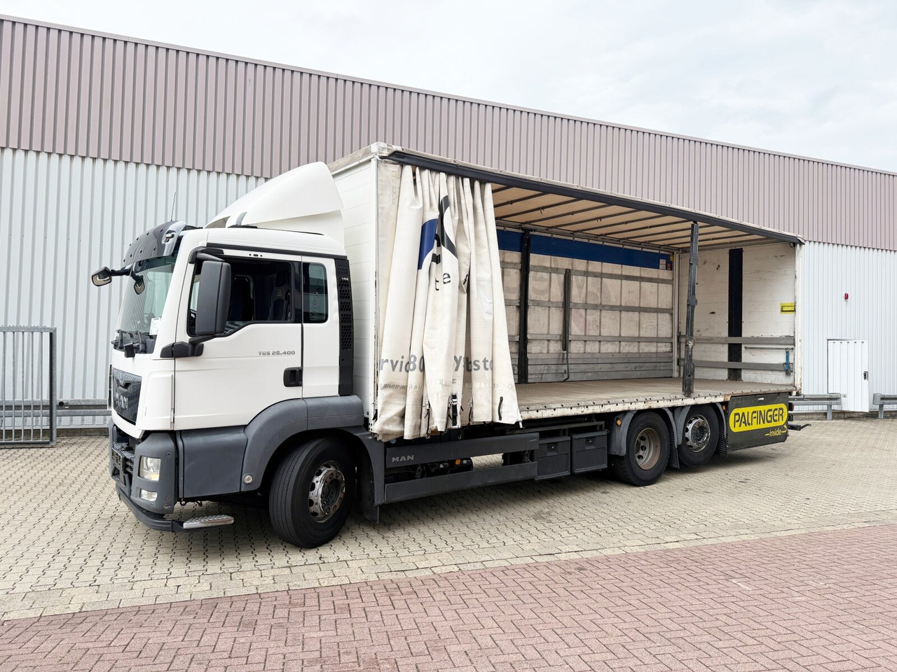 MAN TGS 26.400 6x2-4 LL TGS 26.400 6x2-4 LL, Lenk-/Liftachse - Pritsche LKW, Autokran: das Bild 1 MAN TGS 26.400 6x2-4 LL TGS 26.400 6x2-4 LL, Lenk-/Liftachse - Pritsche LKW, Autokran: das Bild 1