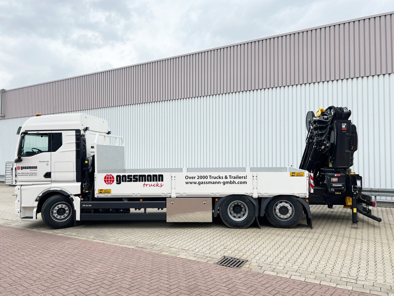 MAN TGX 26.510 6x2-4 LL CH TGX 26.510 6x2-4 LL, Kran Hiab X-HiPro 548 E-8, Lenk-/Liftachse, TwistLock 20Fuß, Funk, Retarder - Autokran, Pritsche LKW: das Bild 2 MAN TGX 26.510 6x2-4 LL CH TGX 26.510 6x2-4 LL, Kran Hiab X-HiPro 548 E-8, Lenk-/Liftachse, TwistLock 20Fuß, Funk, Retarder - Autokran, Pritsche LKW: das Bild 2