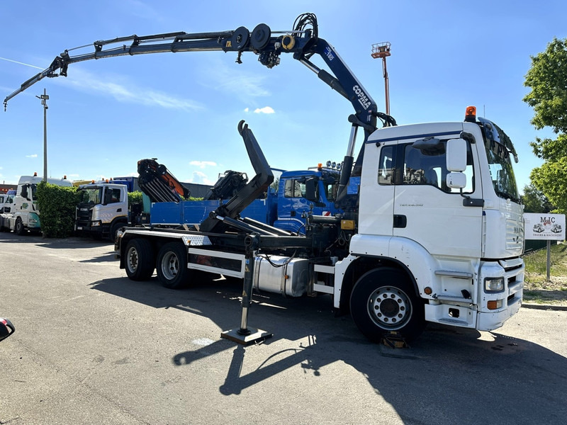 MAN TGA 26.310 6X2 HOOKLIFT + CRANE COPMA 160.4 + JIB J2 + WINCH - RADIO - LIFT + STEERING AXLE - EURO 3 - BE - Abrollkipper, Autokran: das Bild 1 MAN TGA 26.310 6X2 HOOKLIFT + CRANE COPMA 160.4 + JIB J2 + WINCH - RADIO - LIFT + STEERING AXLE - EURO 3 - BE - Abrollkipper, Autokran: das Bild 1