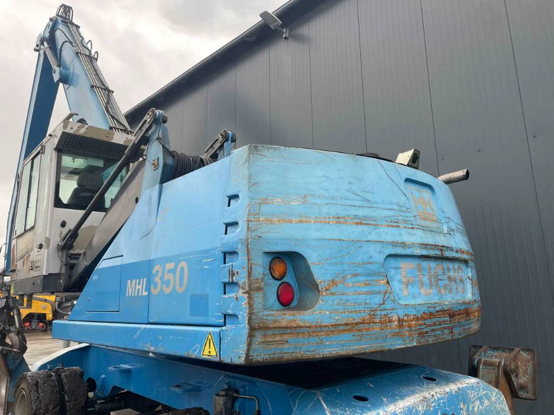 Umschlagbagger Für die Beförderung von Müll Fuchs MHL350: das Bild 9