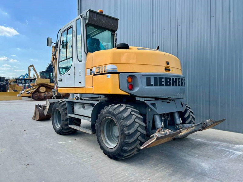 Liebherr A311 Litronic - Mobilbagger: das Bild 2 Liebherr A311 Litronic - Mobilbagger: das Bild 2