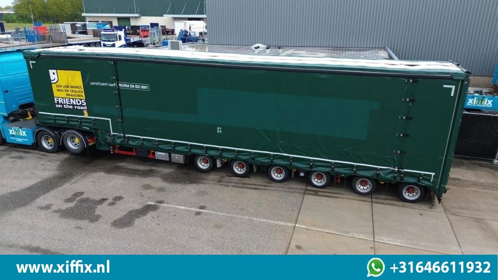 Meusburger 6-ass. Semi dieplader met elektrische huifopbouw / 3x naloop gestuurd - Tieflader Auflieger: das Bild 2 Meusburger 6-ass. Semi dieplader met elektrische huifopbouw / 3x naloop gestuurd - Tieflader Auflieger: das Bild 2
