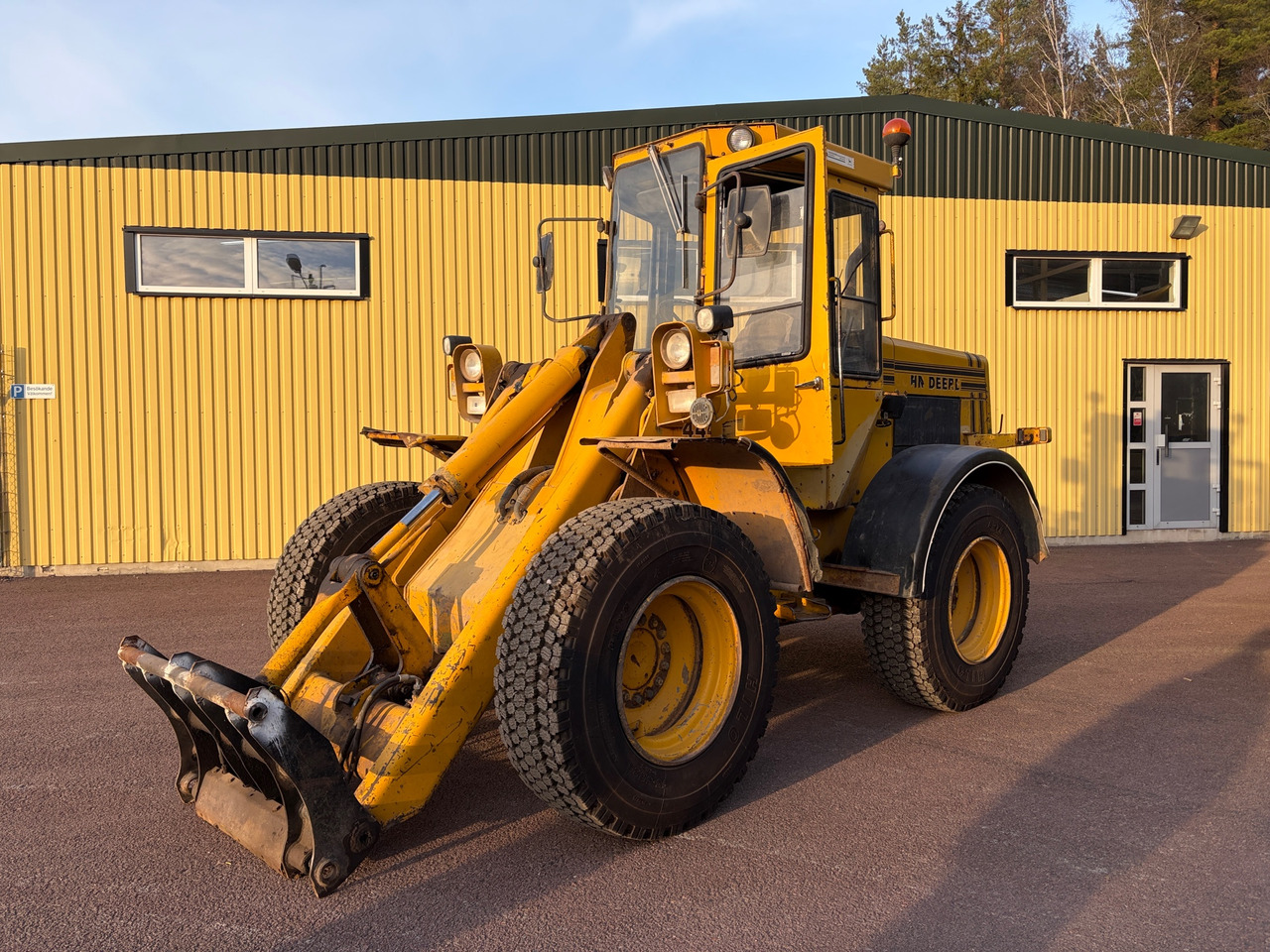 John Deere 444CJ - Radlader: das Bild 1 John Deere 444CJ - Radlader: das Bild 1