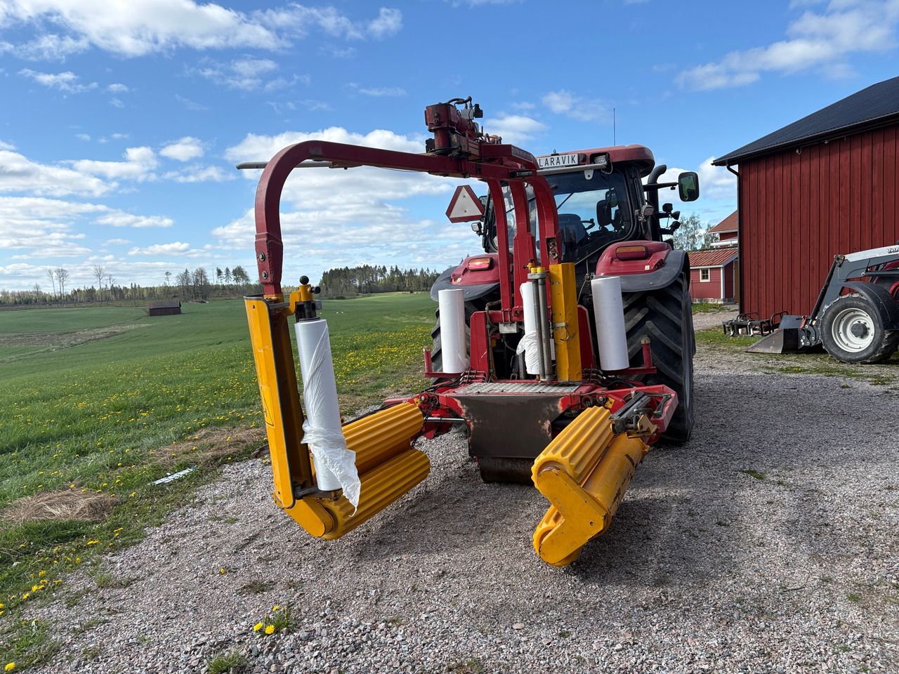 Tellefsdal & New Holland - Ballenwickelgerät: das Bild 1 Tellefsdal & New Holland - Ballenwickelgerät: das Bild 1