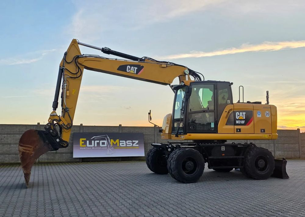 Caterpillar M318F, 2019 ROK, IMPORT NIEMCY - Mobilbagger: das Bild 1 Caterpillar M318F, 2019 ROK, IMPORT NIEMCY - Mobilbagger: das Bild 1