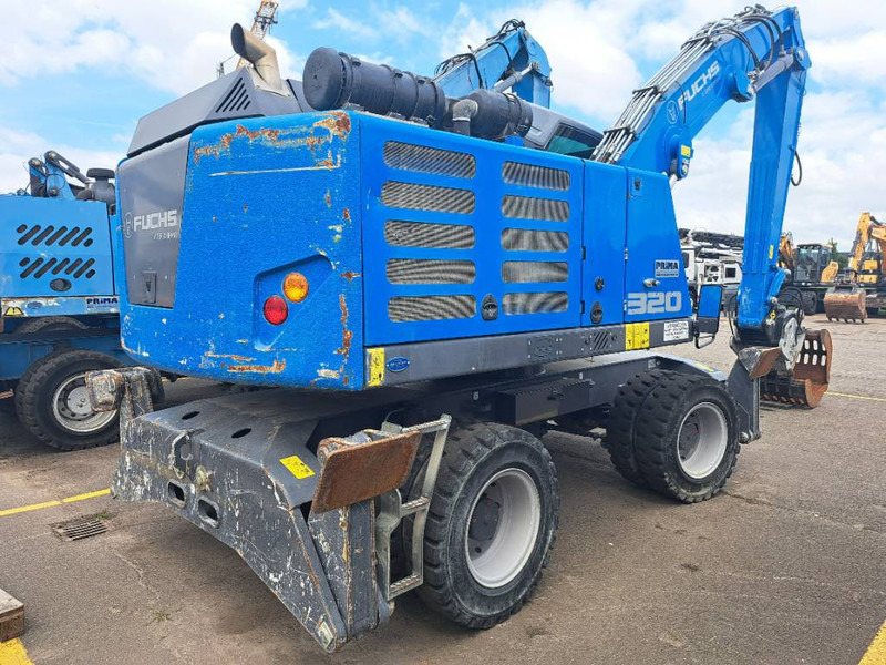 Fuchs MHL320F + Grapple - Umschlagbagger: das Bild 5 Fuchs MHL320F + Grapple - Umschlagbagger: das Bild 5