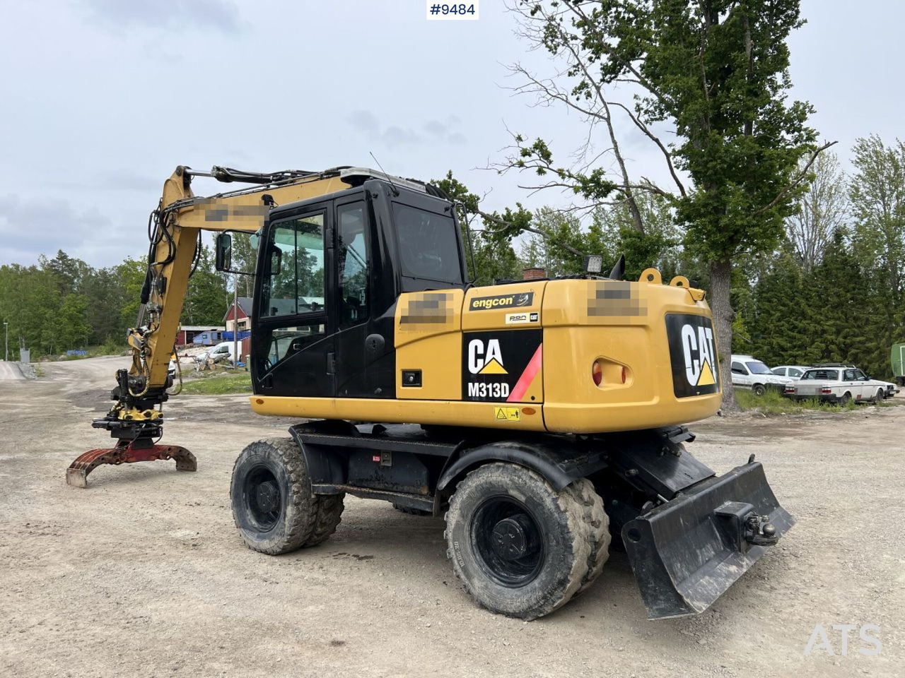 CAT M313D with tipping wagon and attachments (VIDEO) - Mobilbagger: das Bild 5 CAT M313D with tipping wagon and attachments (VIDEO) - Mobilbagger: das Bild 5