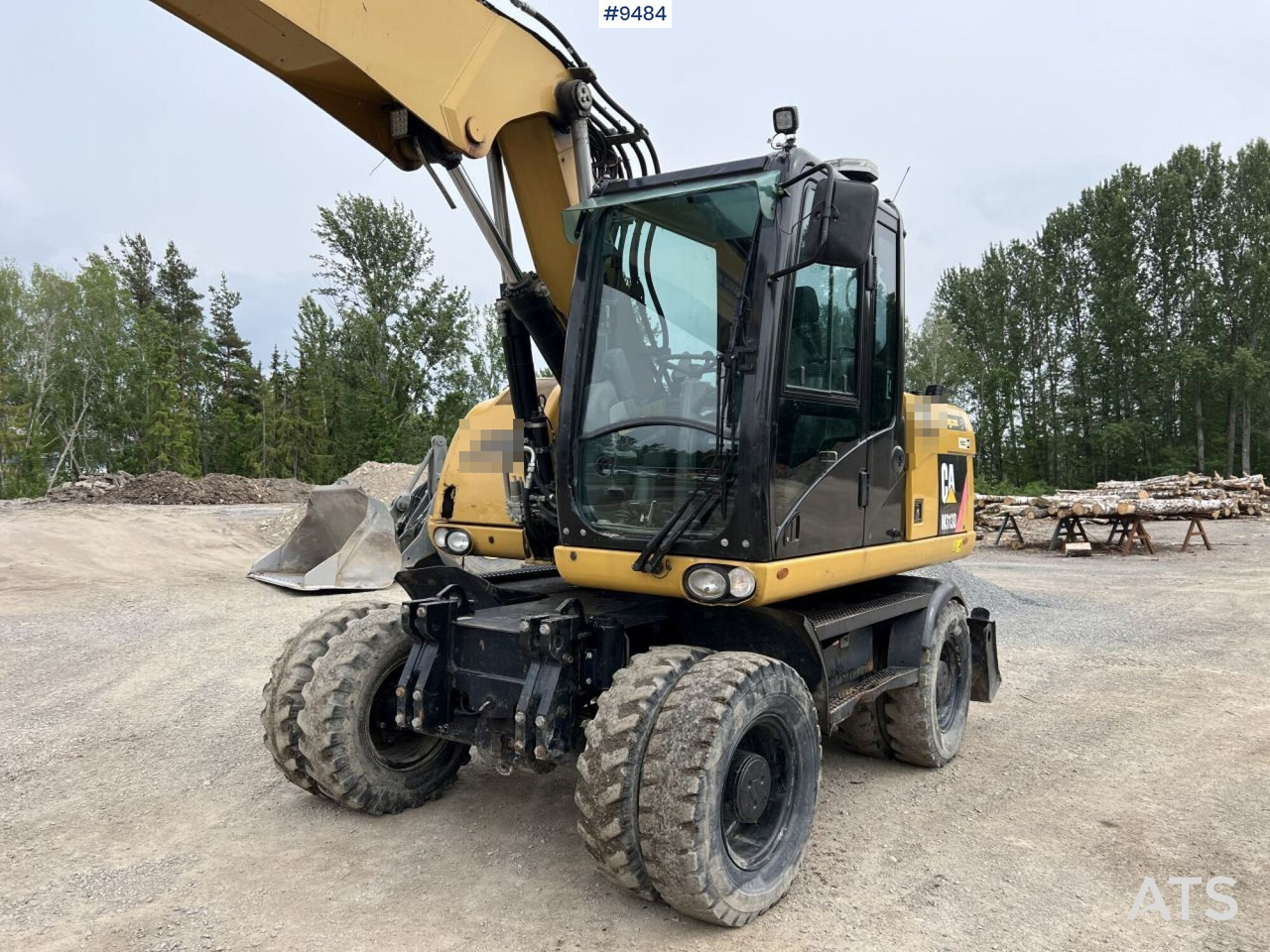 CAT M313D with tipping wagon and attachments (VIDEO) - Mobilbagger: das Bild 4 CAT M313D with tipping wagon and attachments (VIDEO) - Mobilbagger: das Bild 4
