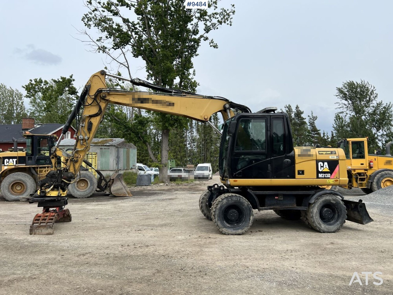 CAT M313D with tipping wagon and attachments (VIDEO) - Mobilbagger: das Bild 2 CAT M313D with tipping wagon and attachments (VIDEO) - Mobilbagger: das Bild 2