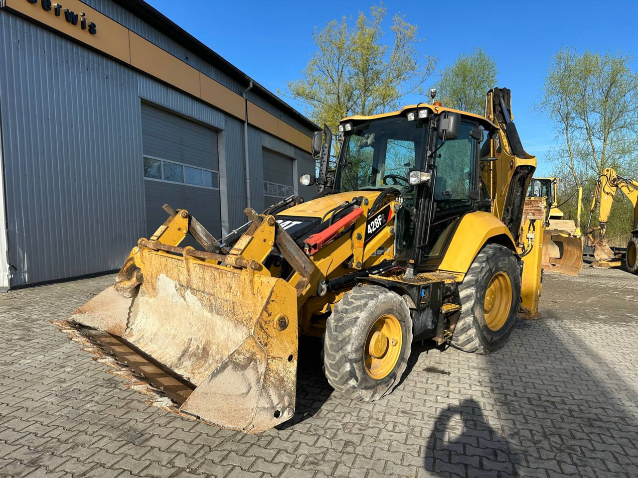 CAT 428F2 - Baggerlader: das Bild 1 CAT 428F2 - Baggerlader: das Bild 1