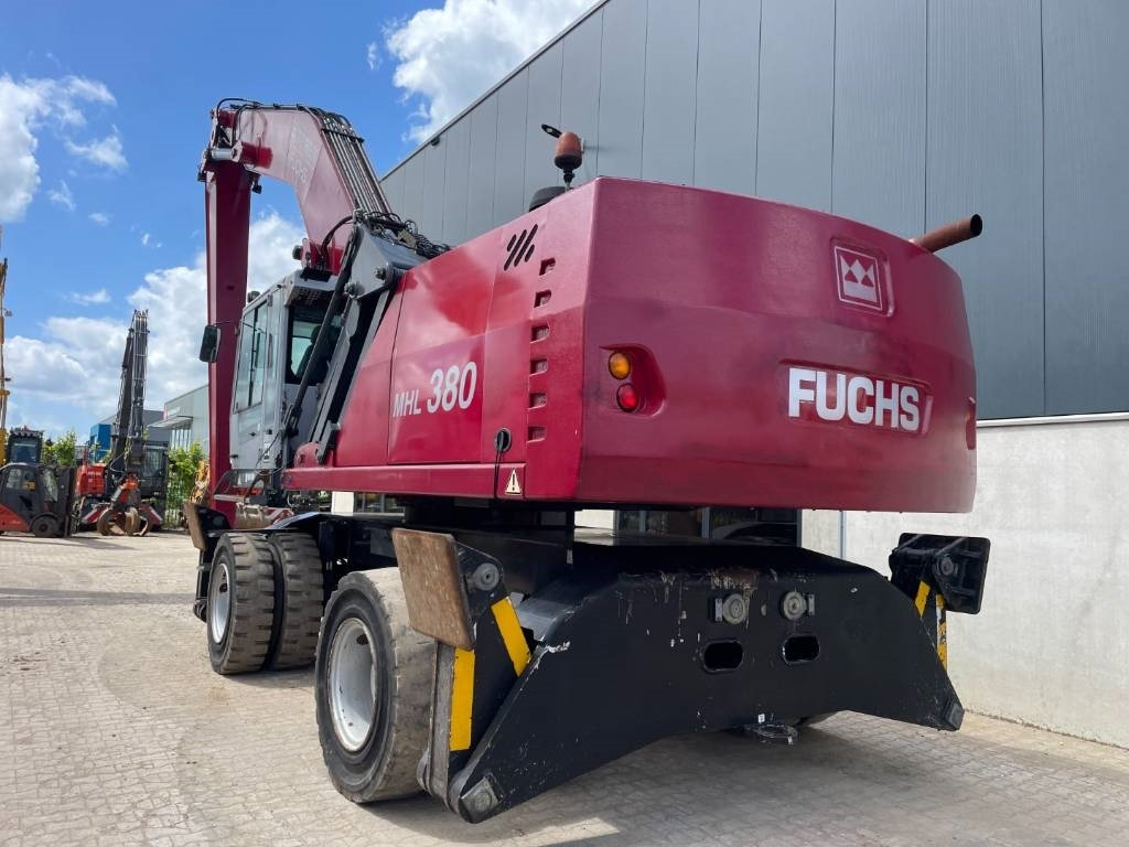 Fuchs MHL380 -- MHL 380 -- 21 mtr reach - Umschlagbagger: das Bild 4 Fuchs MHL380 -- MHL 380 -- 21 mtr reach - Umschlagbagger: das Bild 4