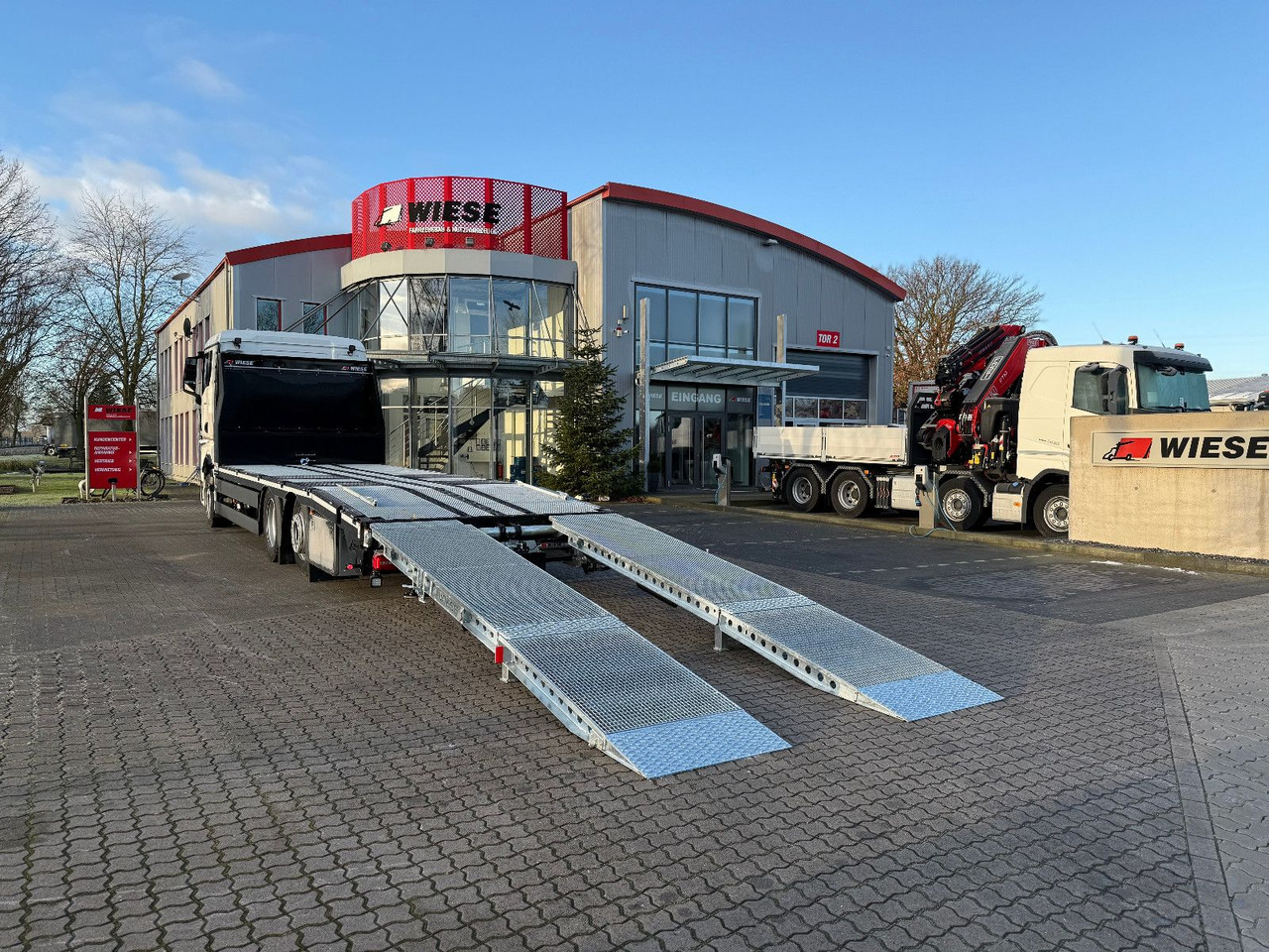 MAN Baumaschinen- Arbeitsbühnentransporter Rampen - Pritsche LKW: das Bild 2 MAN Baumaschinen- Arbeitsbühnentransporter Rampen - Pritsche LKW: das Bild 2