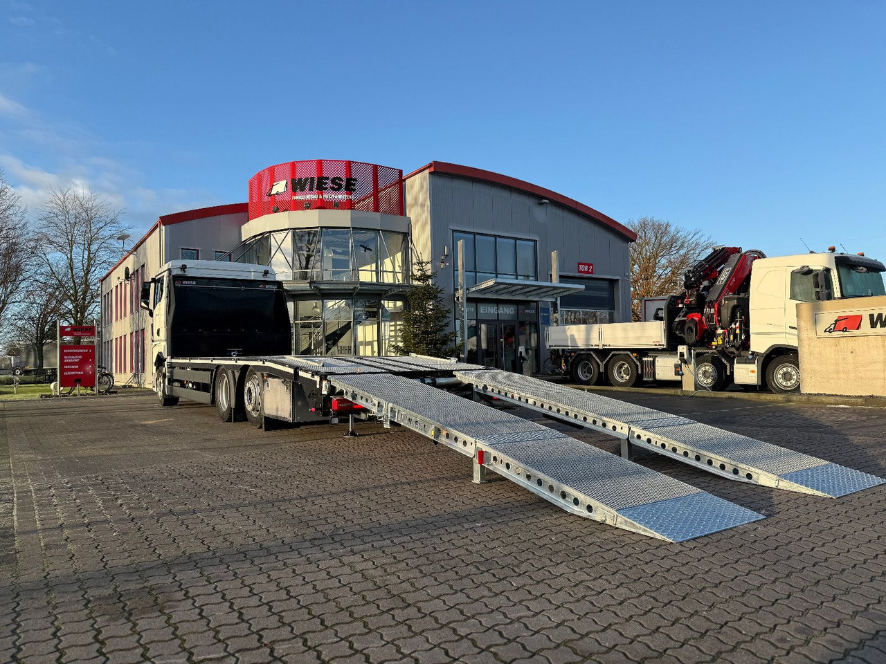 MAN Baumaschinen- Arbeitsbühnentransporter Rampen - Pritsche LKW: das Bild 3 MAN Baumaschinen- Arbeitsbühnentransporter Rampen - Pritsche LKW: das Bild 3