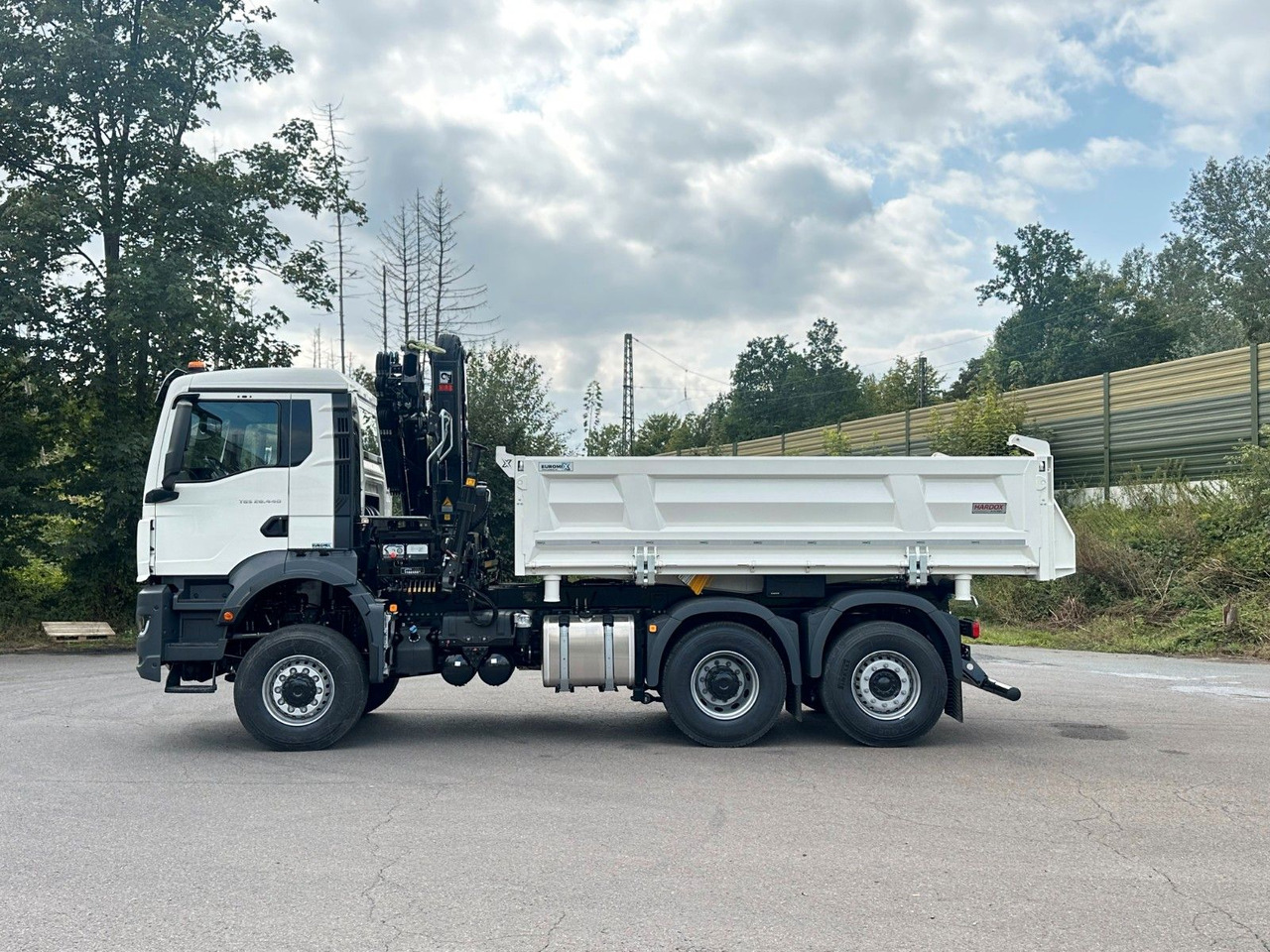 MAN TGS 28.440 6x4-4/3-Seiten- Kipper / Hiab 138-3 - Kipper, Autokran: das Bild 4 MAN TGS 28.440 6x4-4/3-Seiten- Kipper / Hiab 138-3 - Kipper, Autokran: das Bild 4