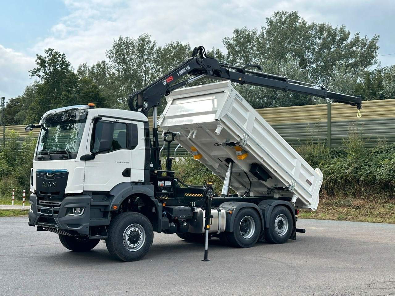 MAN TGS 28.440 6x4-4/3-Seiten- Kipper / Hiab 138-3 - Kipper, Autokran: das Bild 1 MAN TGS 28.440 6x4-4/3-Seiten- Kipper / Hiab 138-3 - Kipper, Autokran: das Bild 1