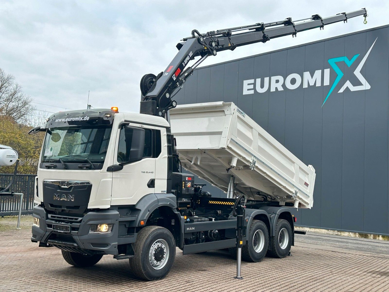 MAN TGS 33.440 6x6 /3-Seiten- Kipper / Kran HIAB 302 - Kipper, Autokran: das Bild 1 MAN TGS 33.440 6x6 /3-Seiten- Kipper / Kran HIAB 302 - Kipper, Autokran: das Bild 1