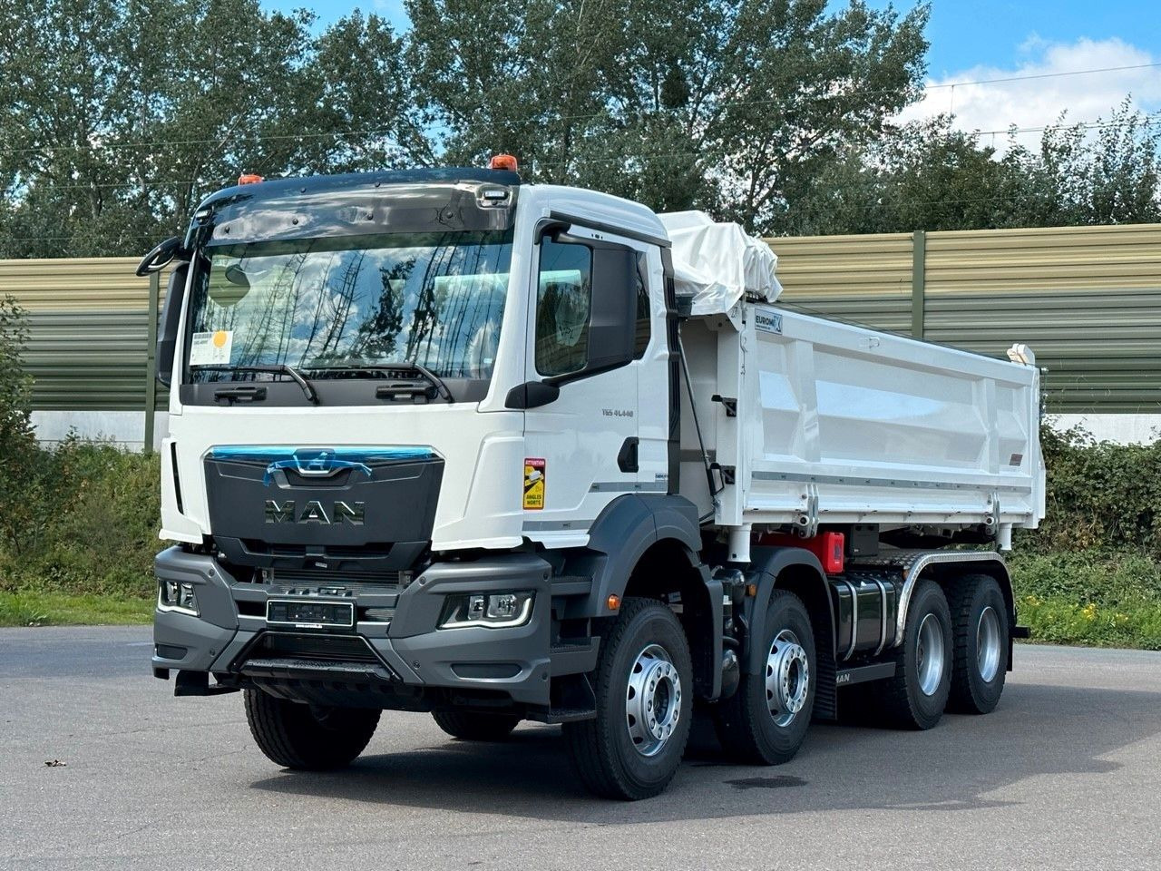 MAN TGS 41.440 8x4 EuromixMTP 3-Seiten-Kipper - Kipper: das Bild 1 MAN TGS 41.440 8x4 EuromixMTP 3-Seiten-Kipper - Kipper: das Bild 1