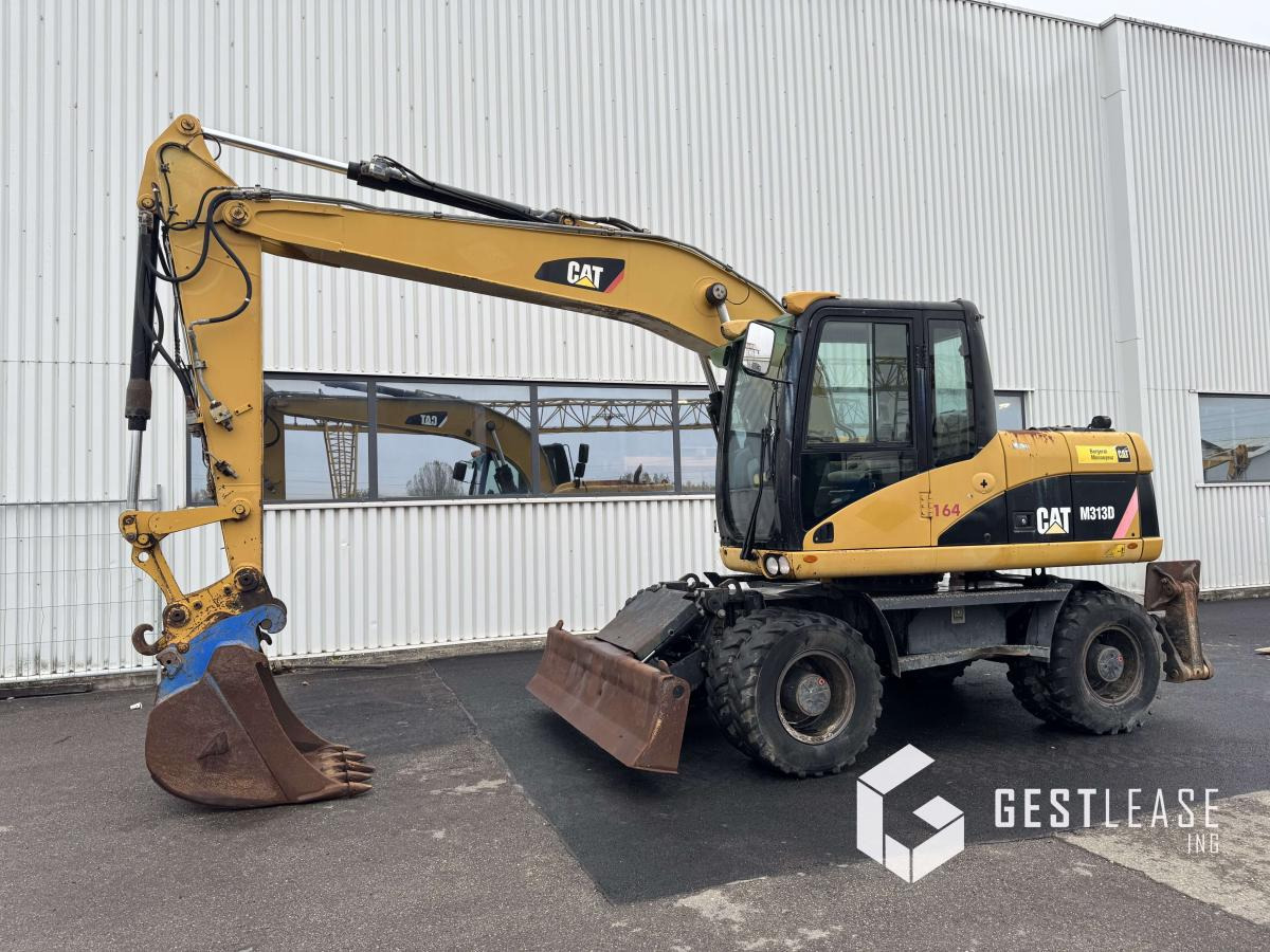 Caterpillar M313D Mono - Mobilbagger: das Bild 1 Caterpillar M313D Mono - Mobilbagger: das Bild 1