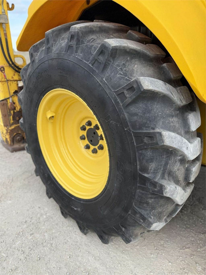 Baggerlader New Holland LB 110 B-4PT: das Bild 14