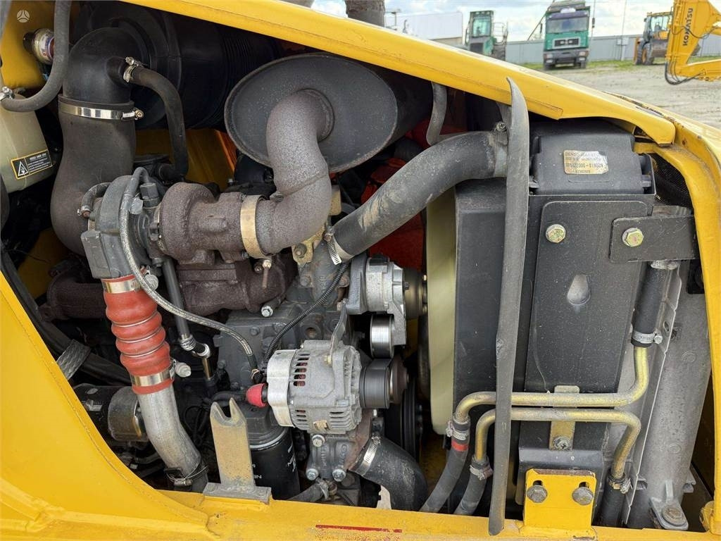 Baggerlader New Holland LB 110 B-4PT: das Bild 20