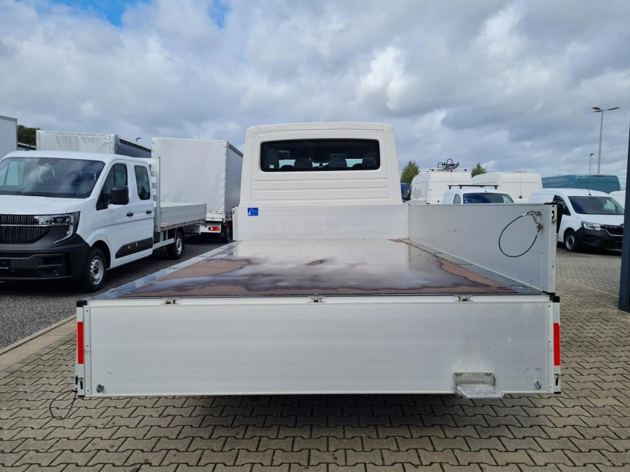 Volkswagen Crafter 35 Doka TDI Pritsche L4 4Motion - Pritsche Transporter, Transporter mit Doppelkabine: das Bild 5 Volkswagen Crafter 35 Doka TDI Pritsche L4 4Motion - Pritsche Transporter, Transporter mit Doppelkabine: das Bild 5