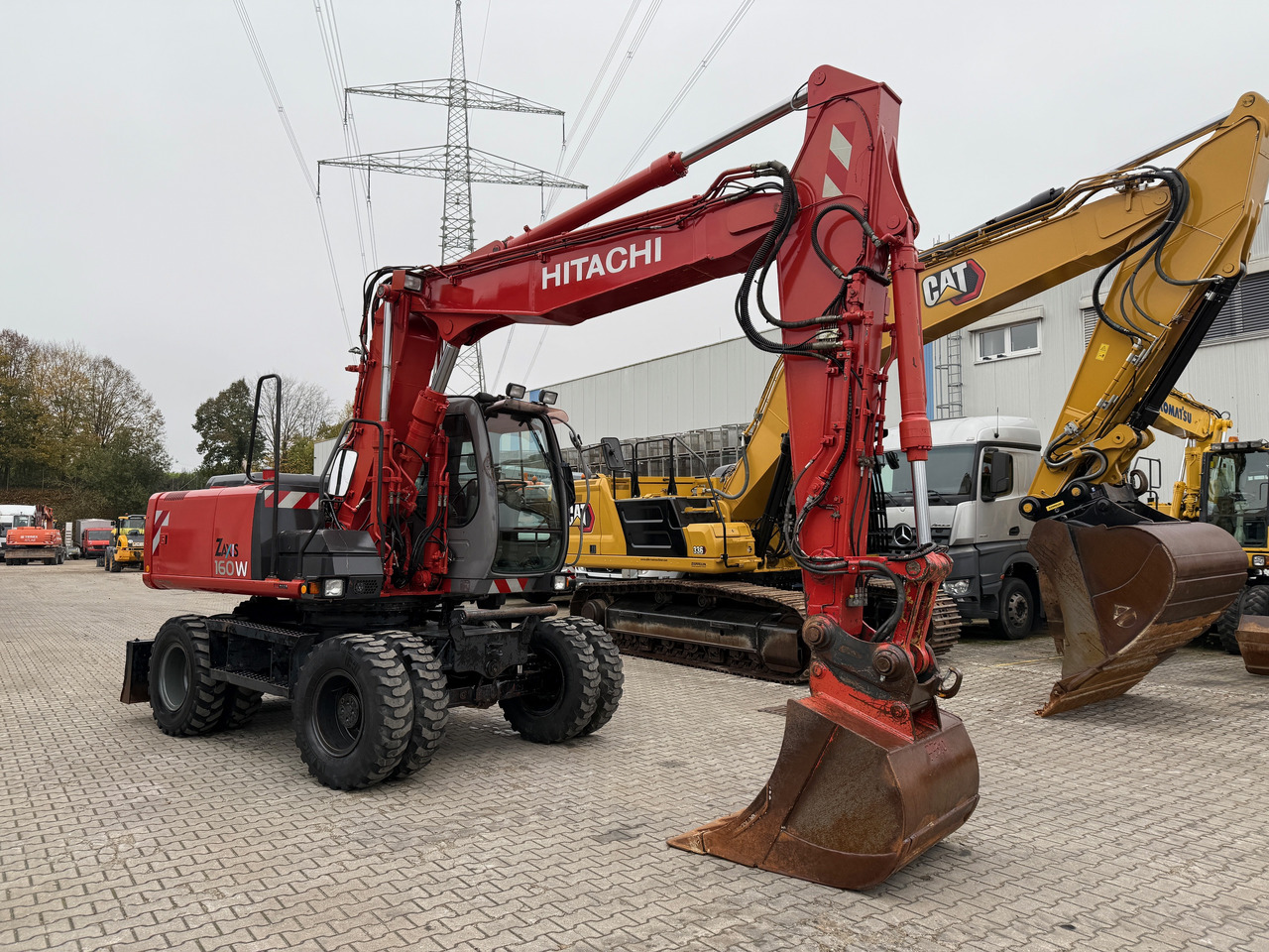 Hitachi ZX 160 W Mobilbagger Klima Zentralschmierung OQ 60-5 - Mobilbagger: das Bild 3 Hitachi ZX 160 W Mobilbagger Klima Zentralschmierung OQ 60-5 - Mobilbagger: das Bild 3