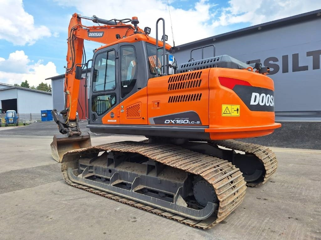 Doosan DX160LCH-5 METSÄMALLI KALLISTAJALLA - Kettenbagger: das Bild 2 Doosan DX160LCH-5 METSÄMALLI KALLISTAJALLA - Kettenbagger: das Bild 2