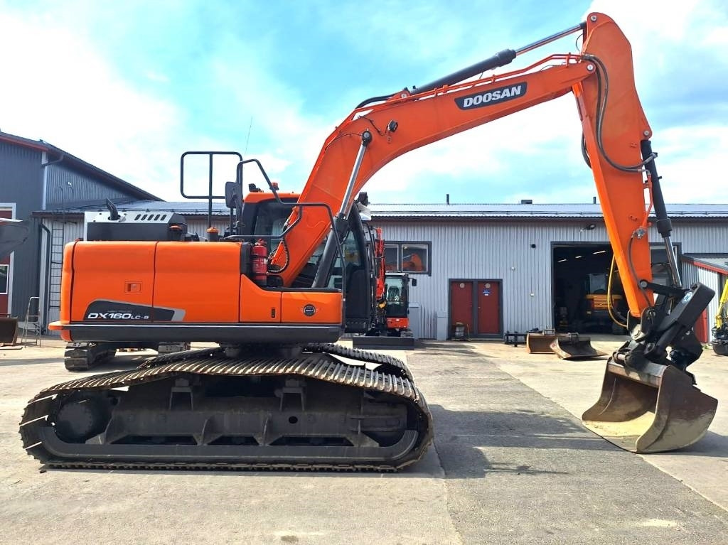 Doosan DX160LCH-5 METSÄMALLI KALLISTAJALLA - Kettenbagger: das Bild 5 Doosan DX160LCH-5 METSÄMALLI KALLISTAJALLA - Kettenbagger: das Bild 5