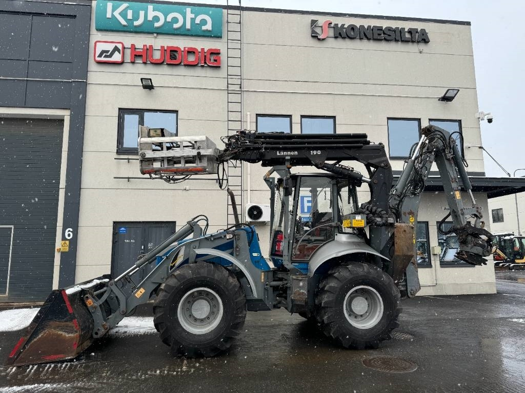 Lännen 8600E PYÖRITTÄJÄ, NOSTIN YM. - Baggerlader: das Bild 1 Lännen 8600E PYÖRITTÄJÄ, NOSTIN YM. - Baggerlader: das Bild 1