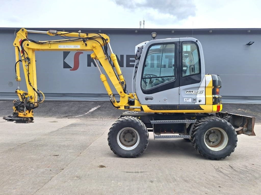 New Holland MYYTY! SOLD! MH2.6 ENGCON PIHDEILLÄ - Mobilbagger: das Bild 1 New Holland MYYTY! SOLD! MH2.6 ENGCON PIHDEILLÄ - Mobilbagger: das Bild 1