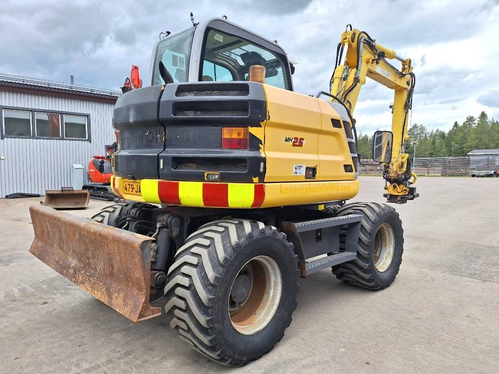 New Holland MYYTY! SOLD! MH2.6 ENGCON PIHDEILLÄ - Mobilbagger: das Bild 4 New Holland MYYTY! SOLD! MH2.6 ENGCON PIHDEILLÄ - Mobilbagger: das Bild 4