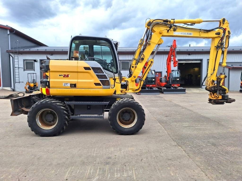 New Holland MYYTY! SOLD! MH2.6 ENGCON PIHDEILLÄ - Mobilbagger: das Bild 5 New Holland MYYTY! SOLD! MH2.6 ENGCON PIHDEILLÄ - Mobilbagger: das Bild 5
