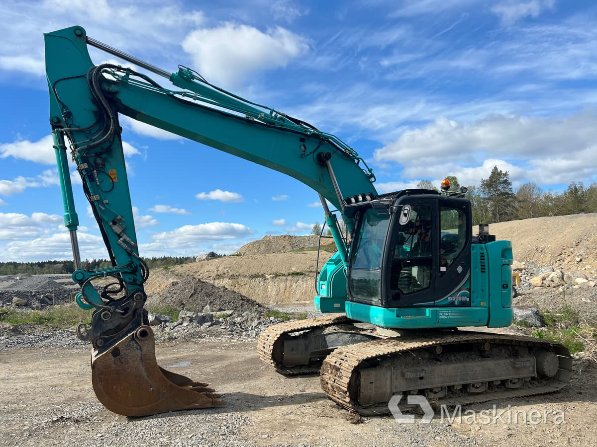 Grävmaskin Kobelco SK230SRLC-5E med tiltrotator & skopor - Kettenbagger: das Bild 1 Grävmaskin Kobelco SK230SRLC-5E med tiltrotator & skopor - Kettenbagger: das Bild 1