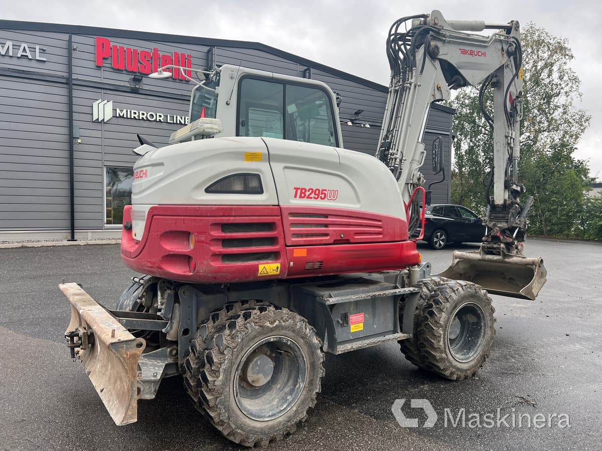 Hjulgrävare Takeuchi TB295W - Kettenbagger: das Bild 5 Hjulgrävare Takeuchi TB295W - Kettenbagger: das Bild 5
