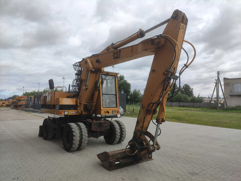 Caterpillar 214 B wheel excavator - Mobilbagger: das Bild 3 Caterpillar 214 B wheel excavator - Mobilbagger: das Bild 3