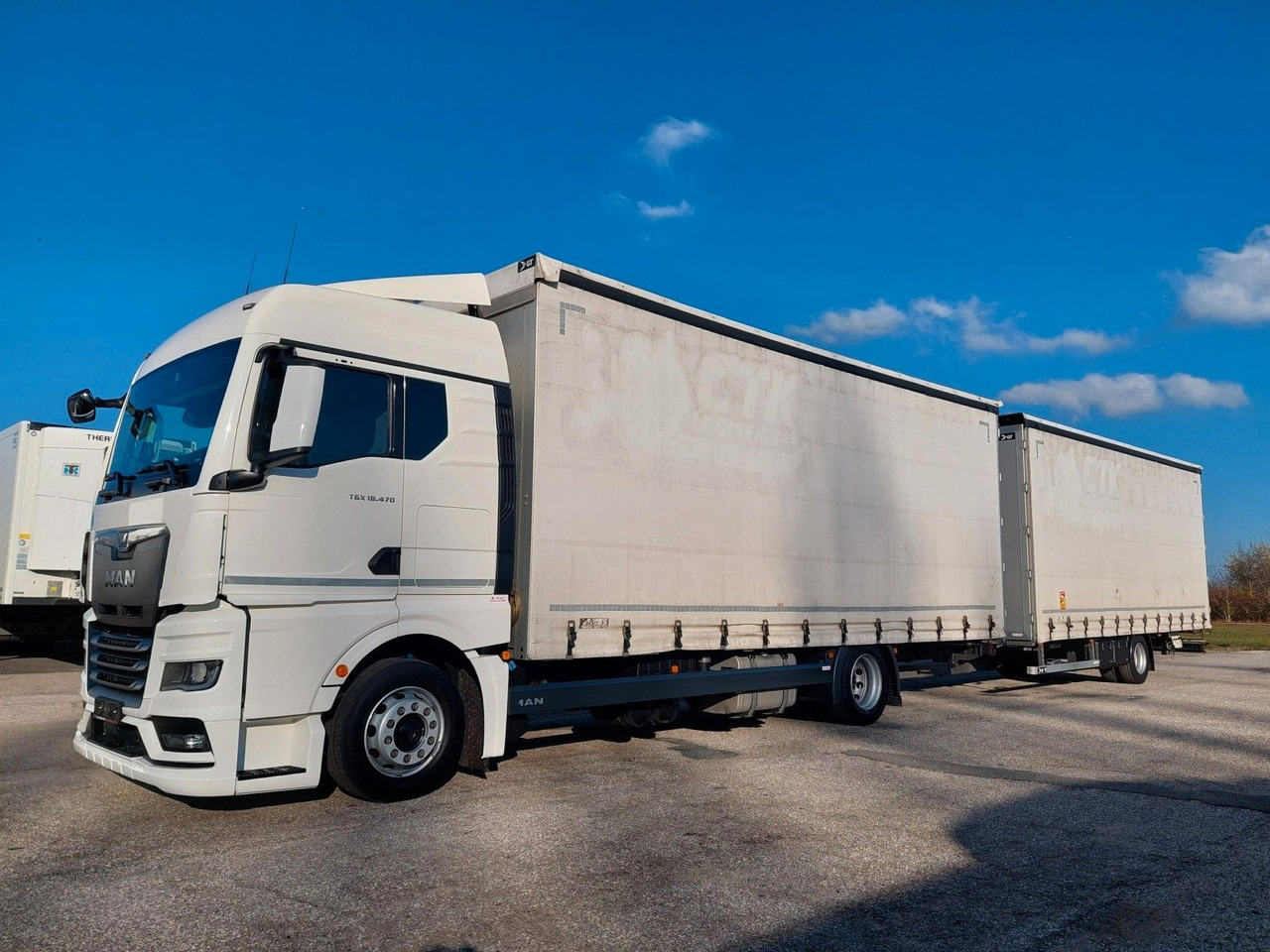 MAN TGX 18.470 LL + Gniotpol G-4080 120 m3 Durchbar - Plane LKW: das Bild 1 MAN TGX 18.470 LL + Gniotpol G-4080 120 m3 Durchbar - Plane LKW: das Bild 1