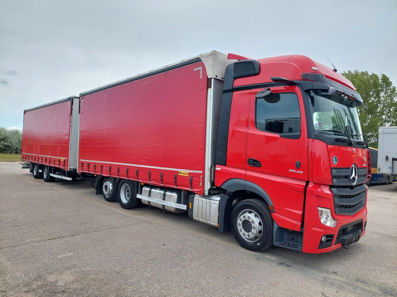 Mercedes-Benz Actros 2545 L/NR 6x2 + Wielton PC2K Durchbar - Plane LKW: das Bild 2 Mercedes-Benz Actros 2545 L/NR 6x2 + Wielton PC2K Durchbar - Plane LKW: das Bild 2