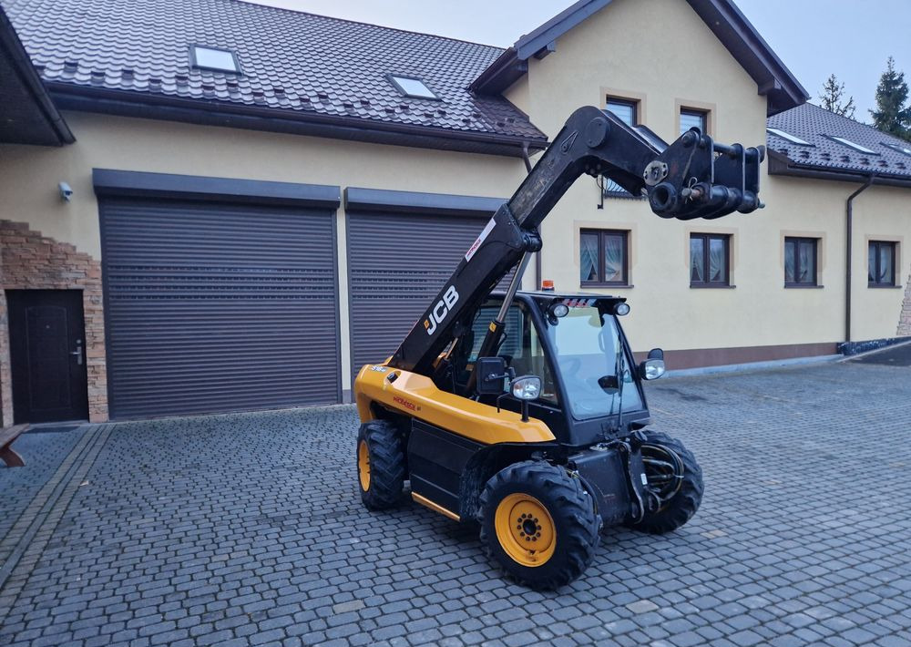 Ładowarka teleskopowa JCB 516-40 2017 Ładowarka teleskopowa JCB - Teleskoplader: das Bild 1 Ładowarka teleskopowa JCB 516-40 2017 Ładowarka teleskopowa JCB - Teleskoplader: das Bild 1