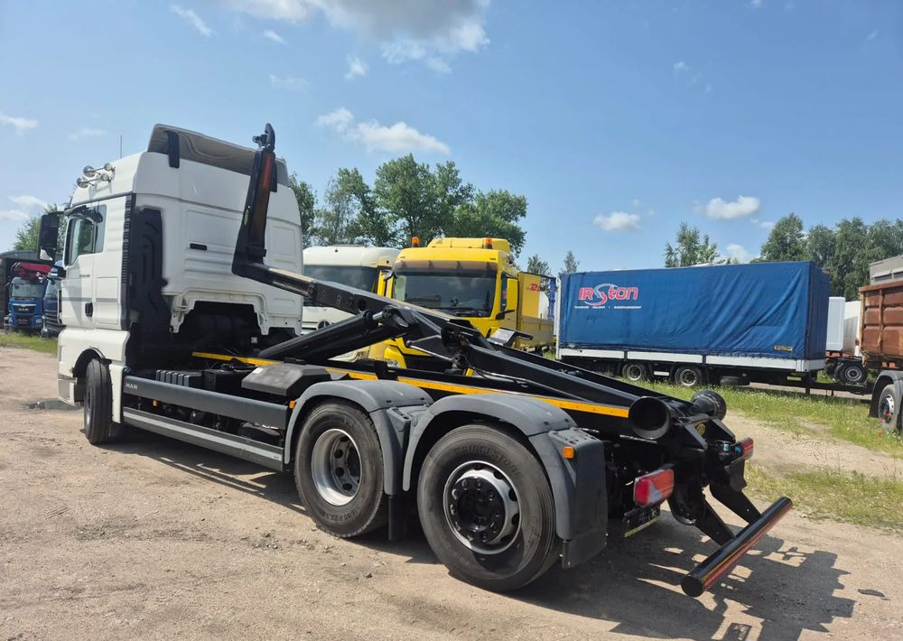 MAN TGX 26-460 oś skrętna Hakowiec - Abrollkipper: das Bild 1 MAN TGX 26-460 oś skrętna Hakowiec - Abrollkipper: das Bild 1
