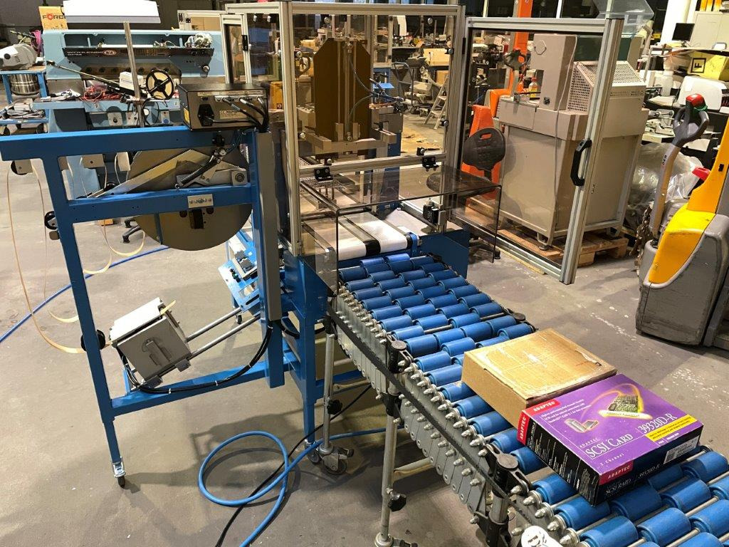 ATS Tanner UltraSonic US 2000-AB transit banding machine with pneumatic product hold-down and infeed roller table - Verpackungsmaschine: das Bild 1 ATS Tanner UltraSonic US 2000-AB transit banding machine with pneumatic product hold-down and infeed roller table - Verpackungsmaschine: das Bild 1