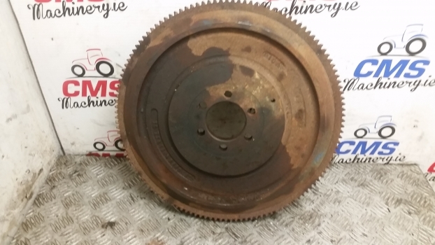 Ford New Holland 40, Ts, 7840 Engine Flywheel Assembly E9nn6375cb, 81866593 - Schwungscheibe für Traktor: das Bild 1 Ford New Holland 40, Ts, 7840 Engine Flywheel Assembly E9nn6375cb, 81866593 - Schwungscheibe für Traktor: das Bild 1